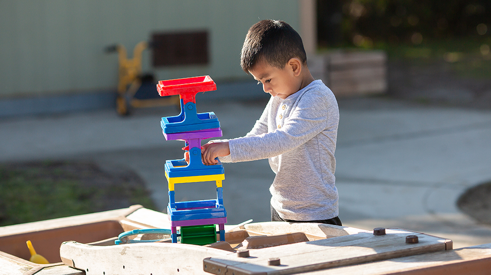Child using blocks to build