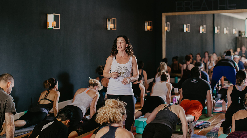 Lisa Mello teaching yoga