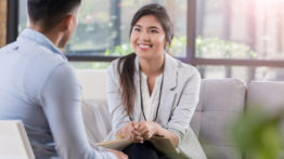 Attentive Counselor Talks With Patient